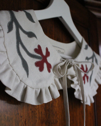 Ornate Floral Collar on Cream Linen