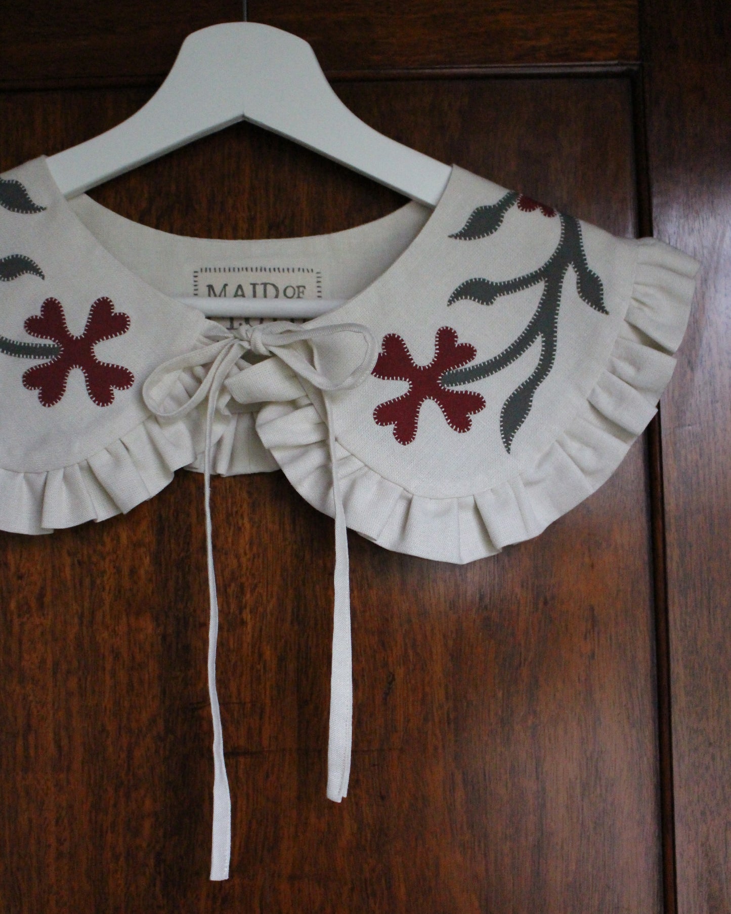 Ornate Floral Collar on Cream Linen