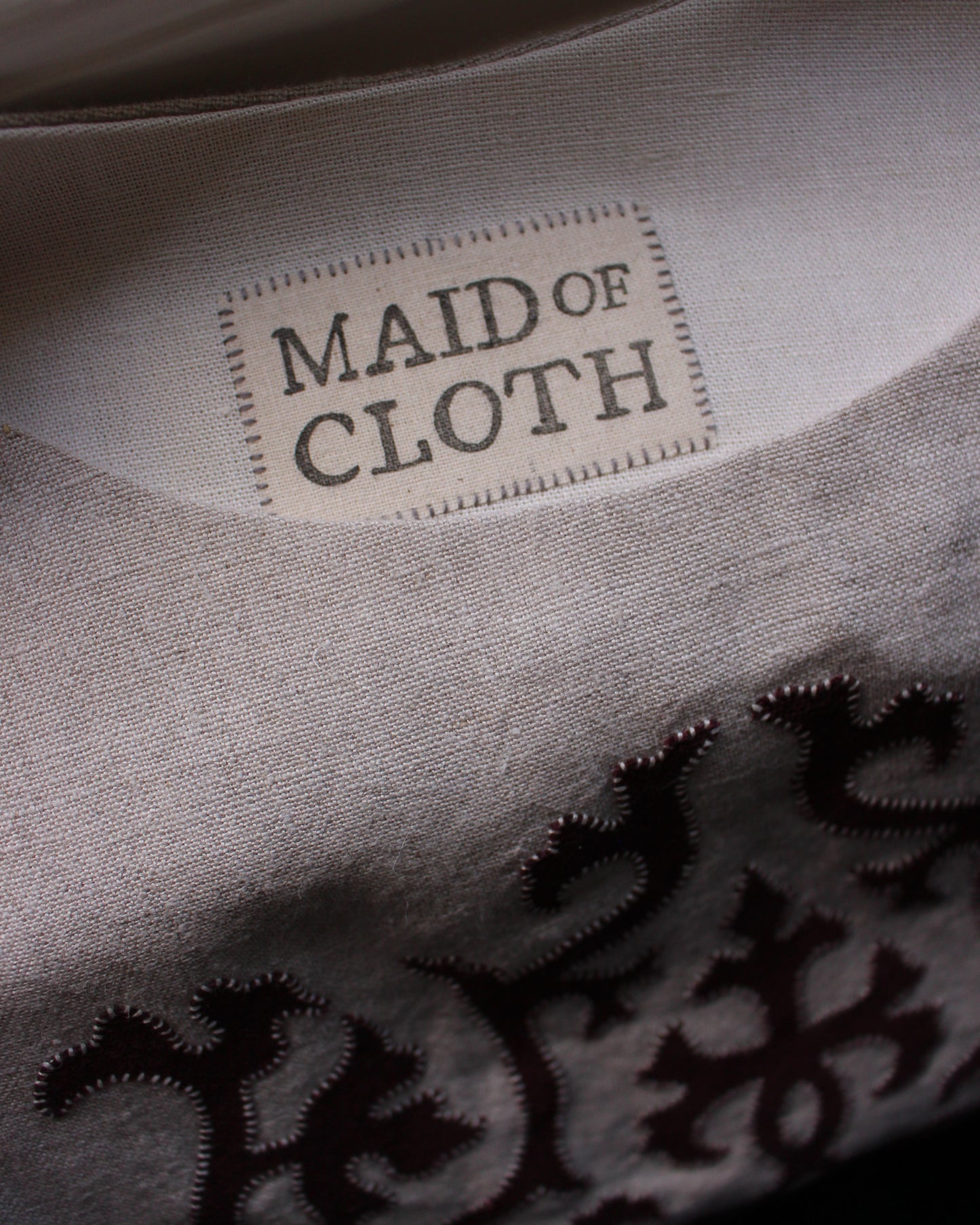 Burgundy Intertwining Vines on Natural Linen