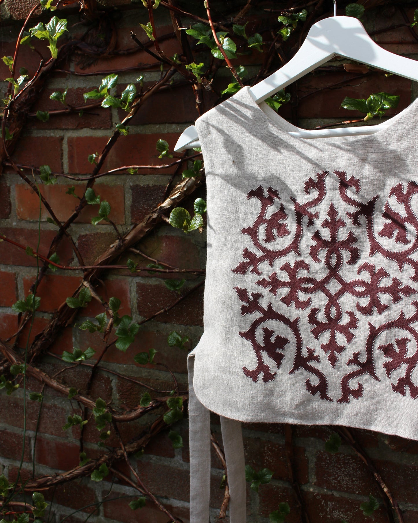 Burgundy Intertwining Vines on Natural Linen