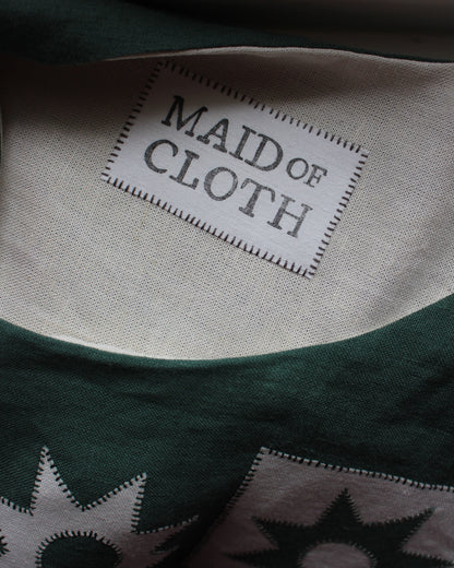 Patchwork Stars On Forest Green Linen