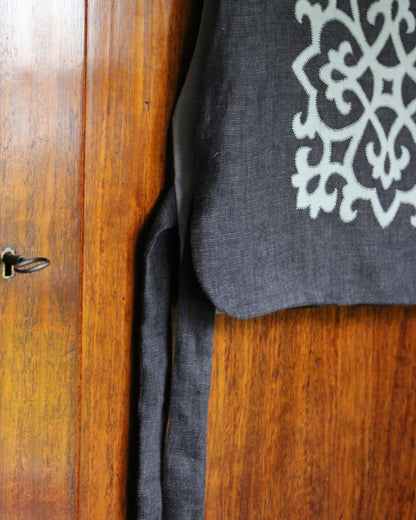 Tudor Tile on Dark Woven Linen