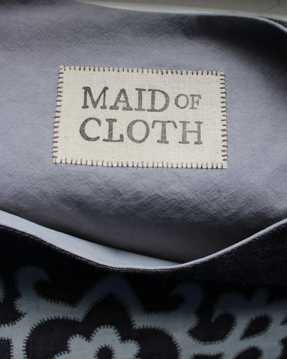 Tudor Tile on Dark Woven Linen