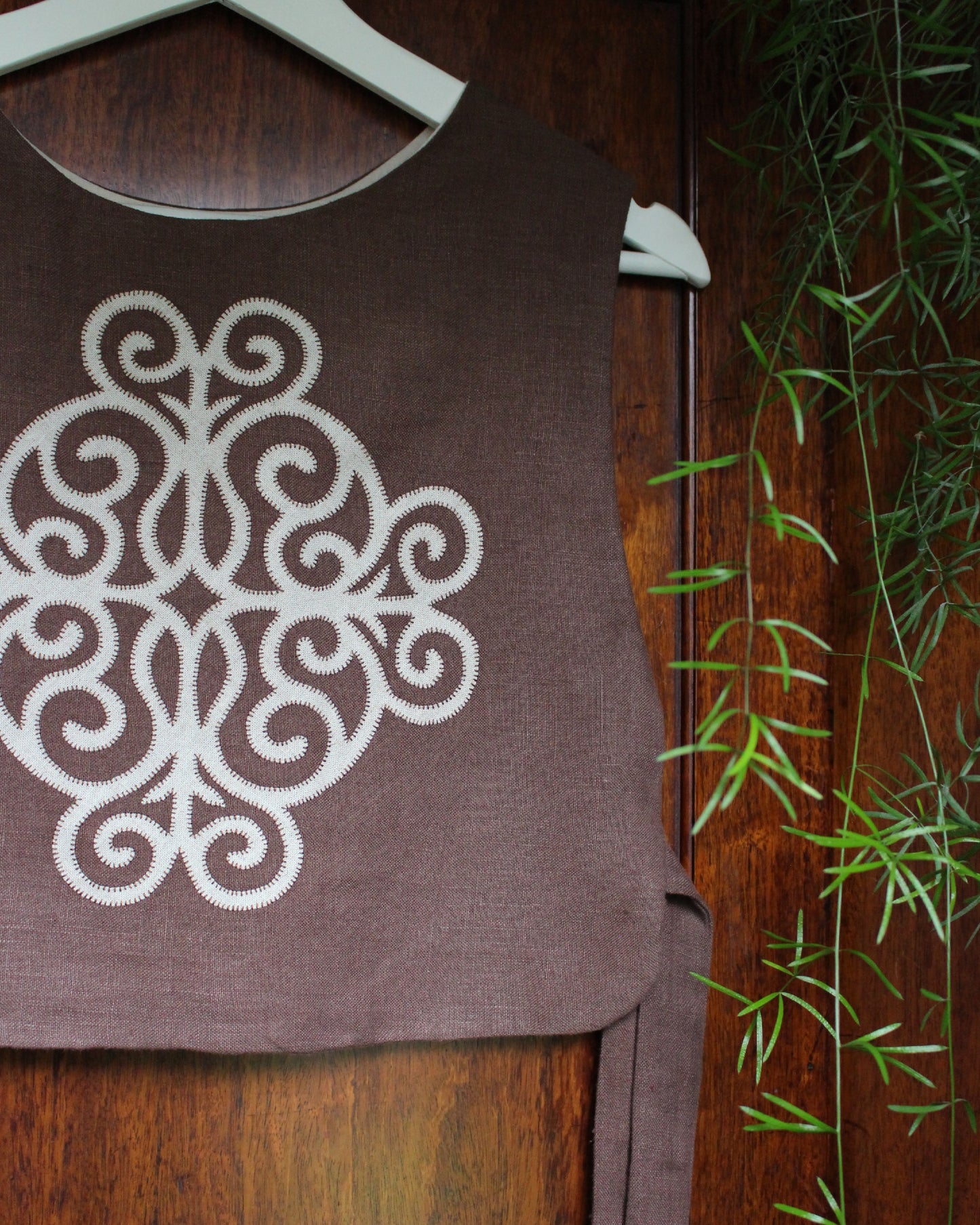 Coiling Medieval Relic on Brown Linen