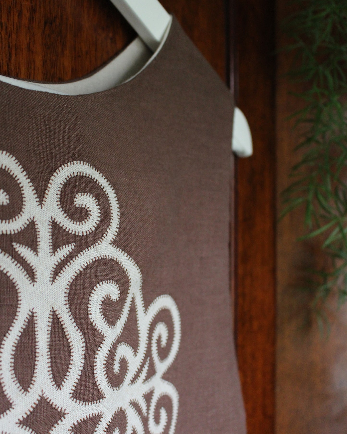 Coiling Medieval Relic on Brown Linen