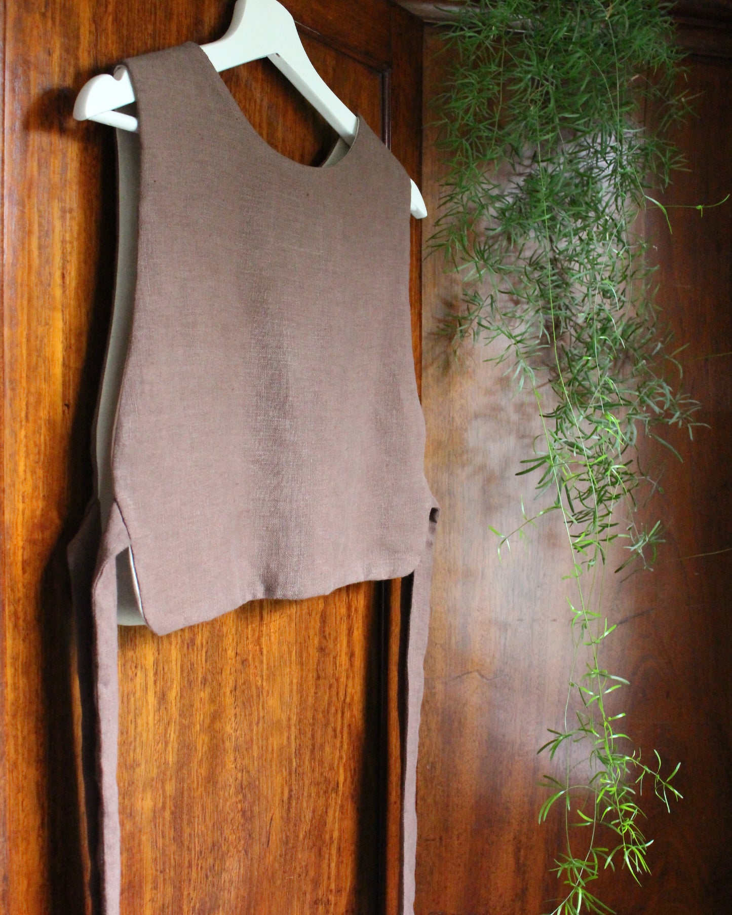 Coiling Medieval Relic on Brown Linen