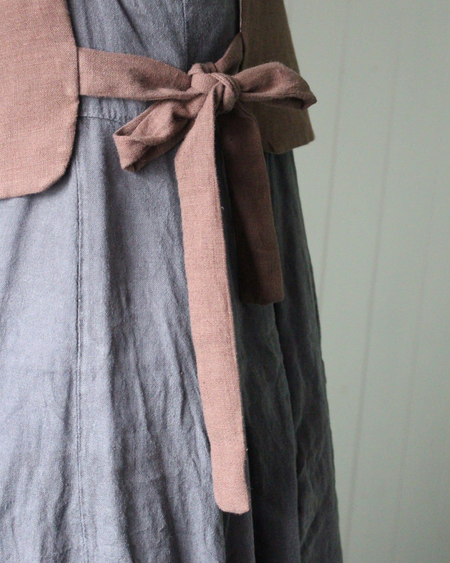 Coiling Medieval Relic on Brown Linen