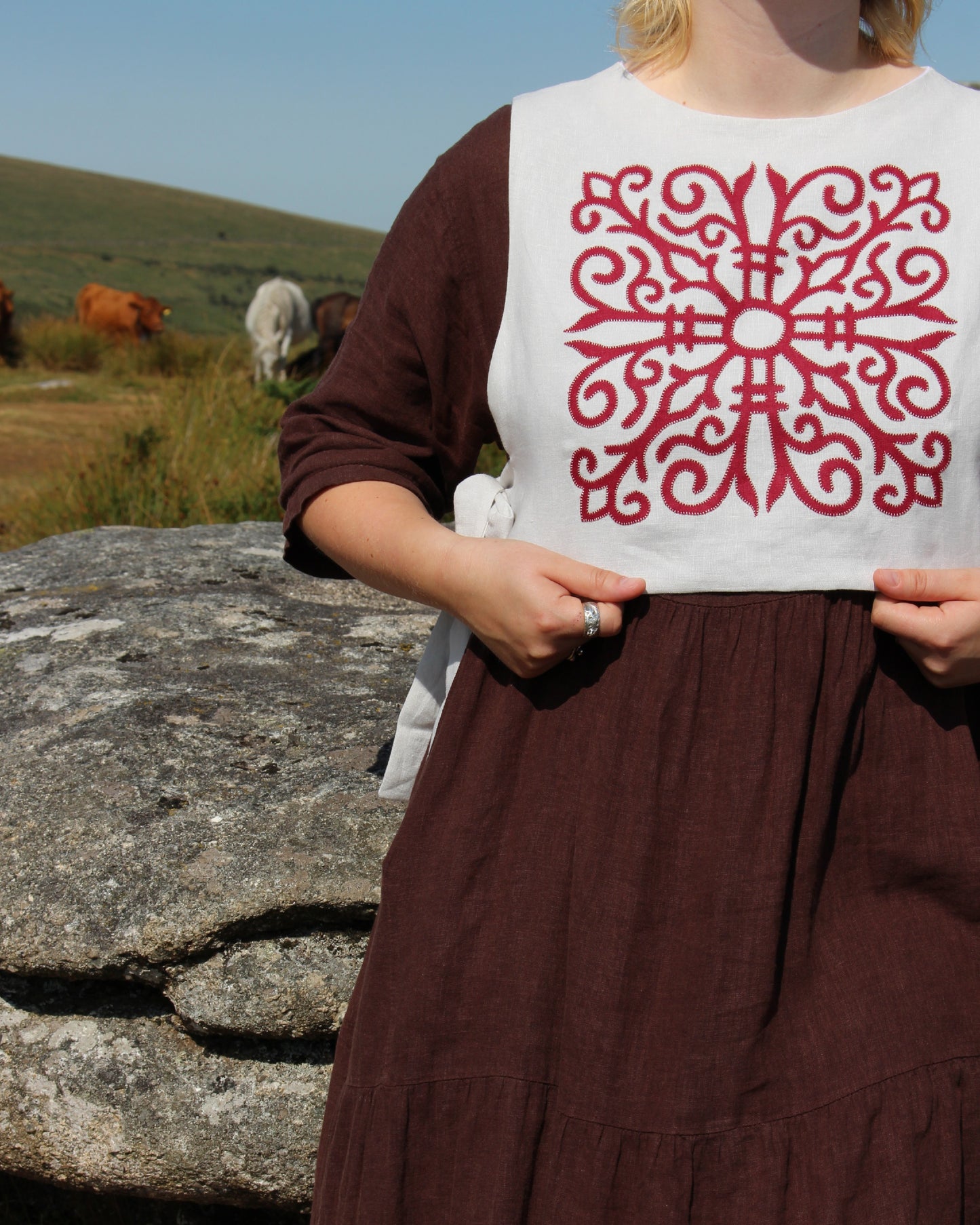 Red Celtic Ornamental Tile on Chalk White Linen