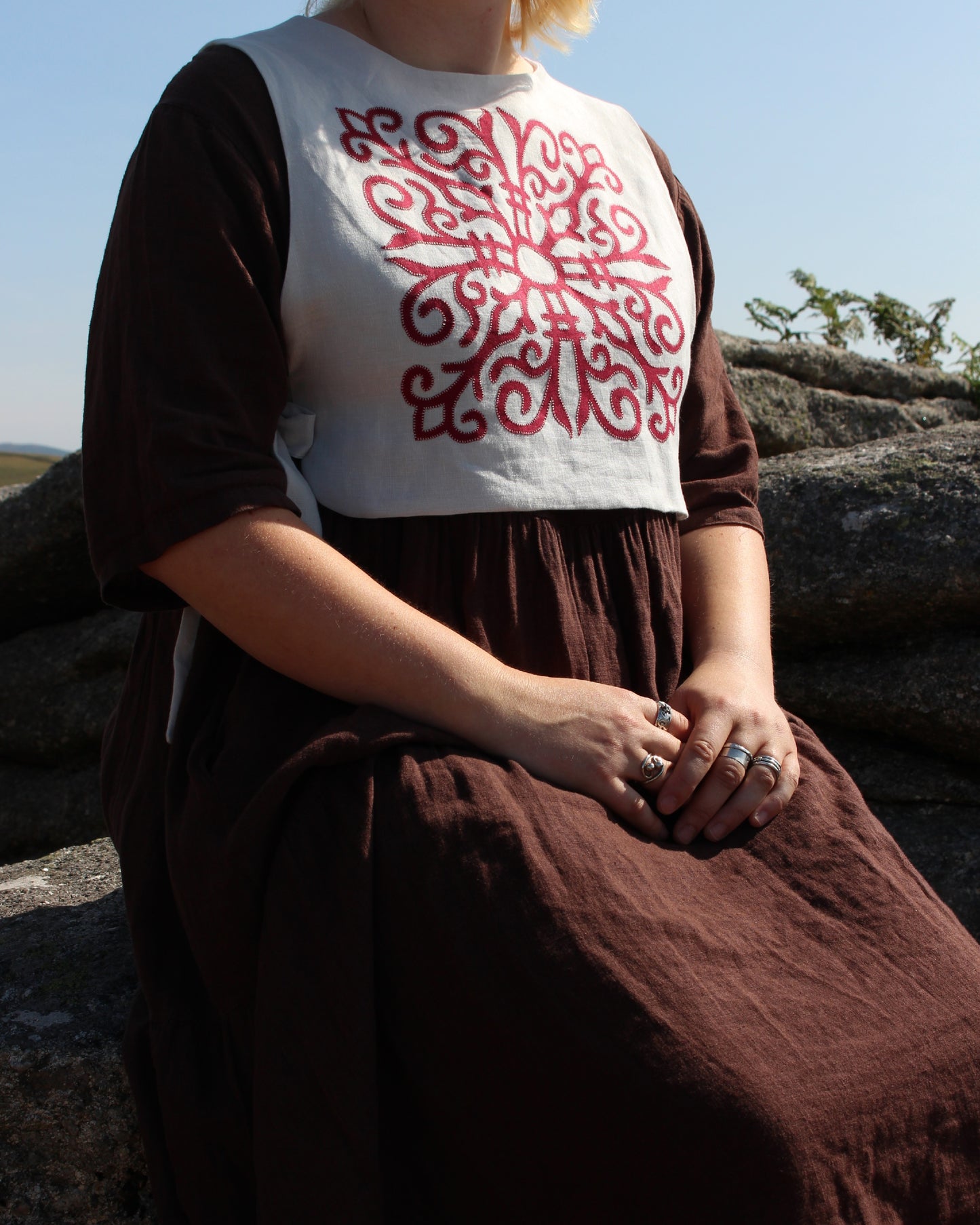 Red Celtic Ornamental Tile on Chalk White Linen