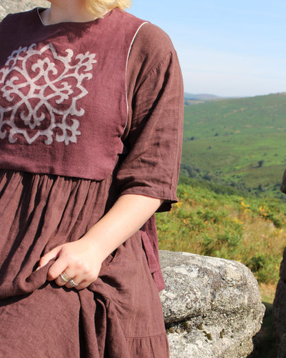 Tudor Tile on Dark Burgundy Plum Linen