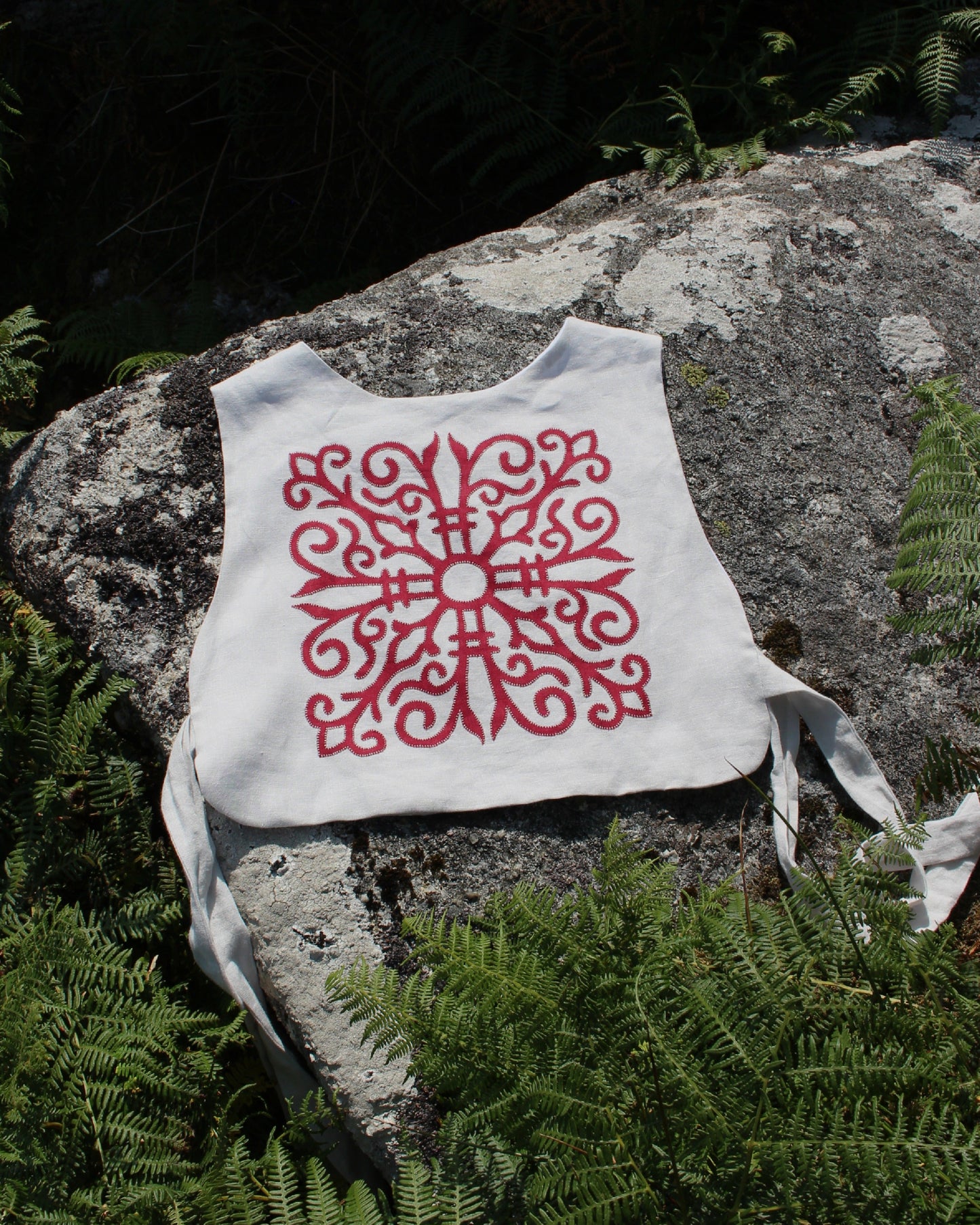 Red Celtic Ornamental Tile on Chalk White Linen