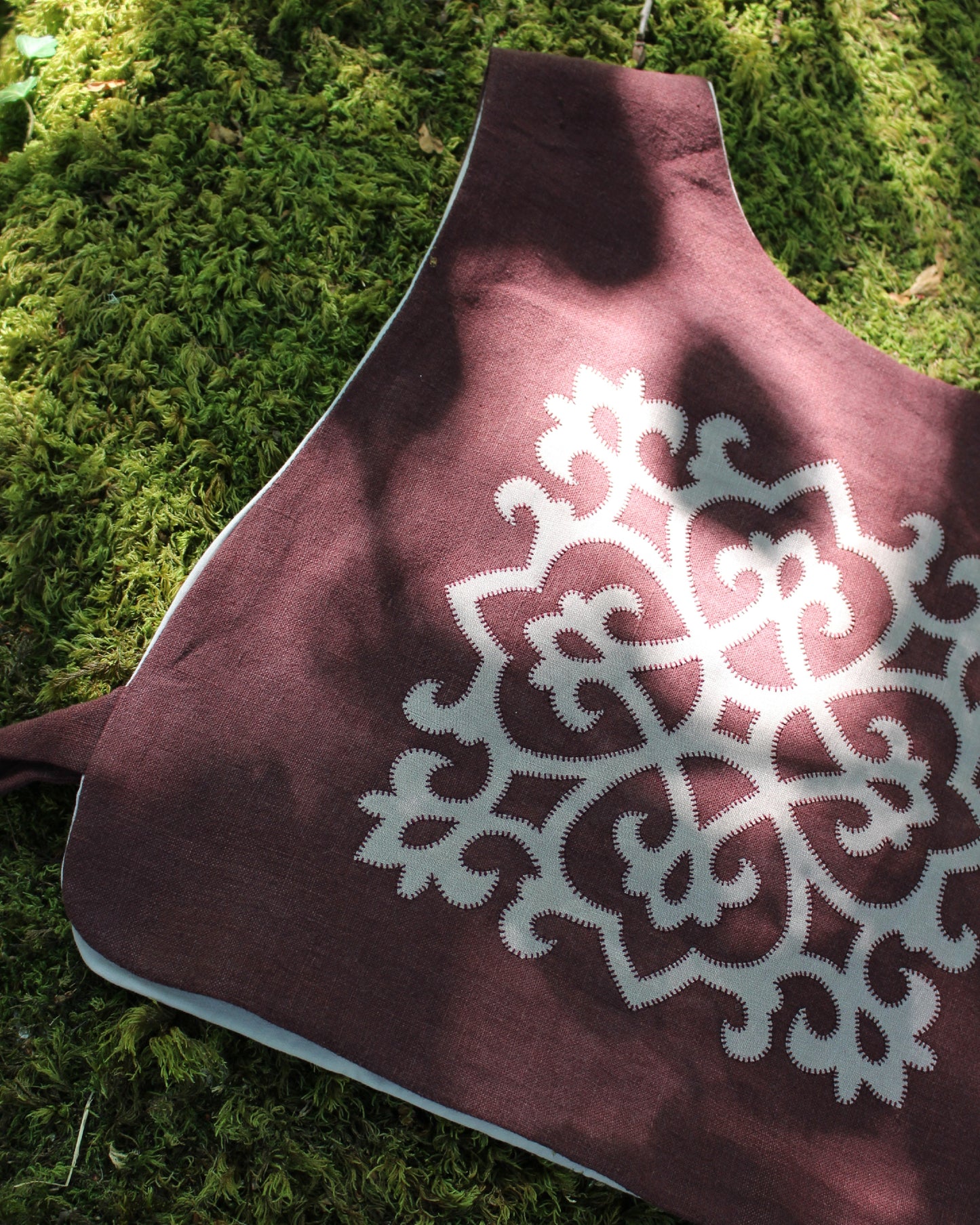 Tudor Tile on Dark Burgundy Plum Linen