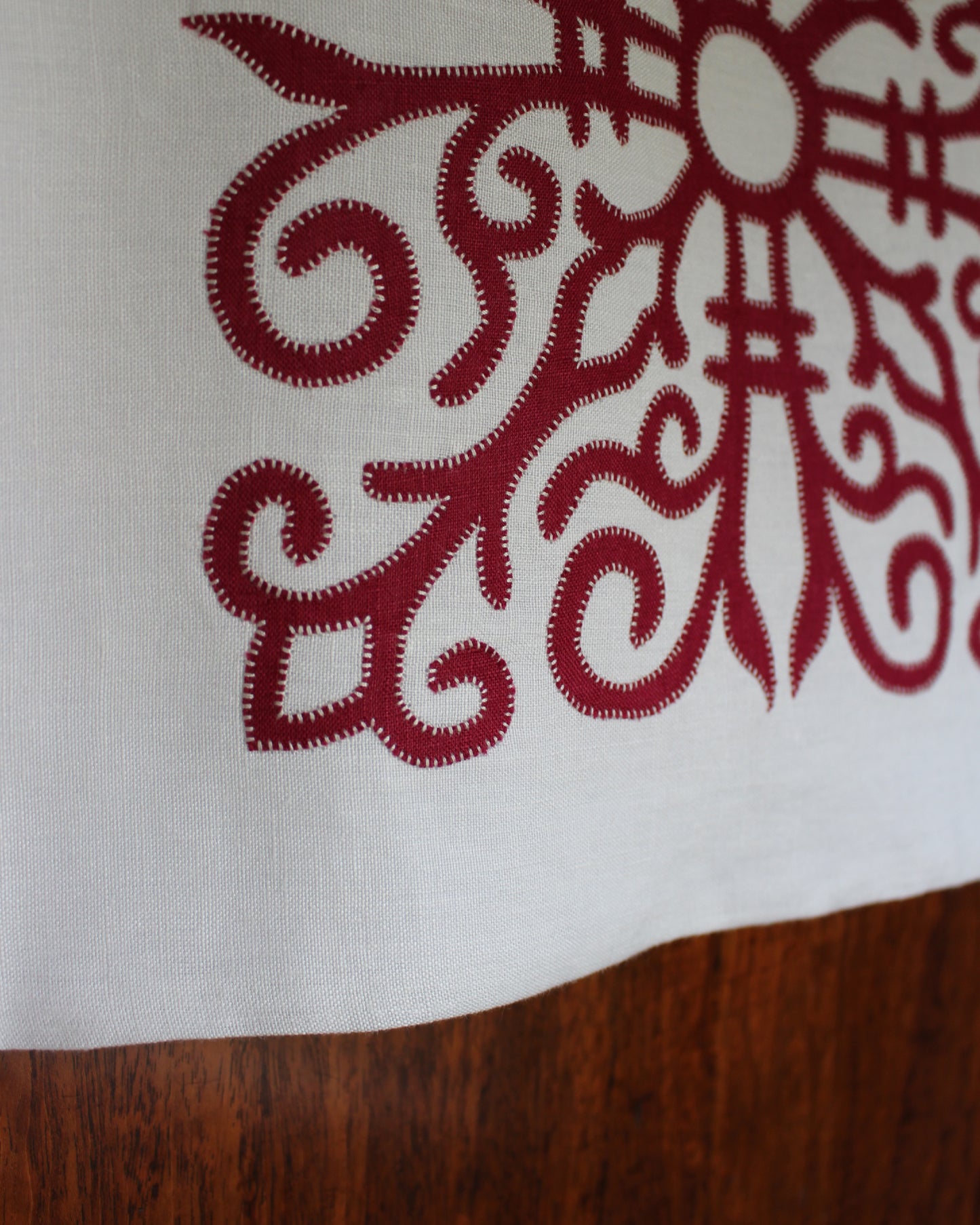 Red Celtic Ornamental Tile on Chalk White Linen