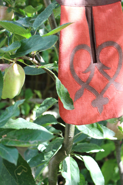 Handmade, Warm Coral Linen Tie on Pocket - Brown Celtic Heart Appliqué